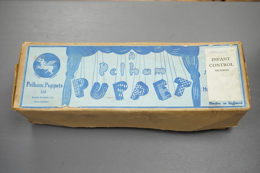 A scarce boxed Pelham Puppet sailor with carved wood cap, ‘Infant Control’